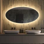 Luxe ovale badkamer spiegel, van alle gemakken voorzien, zoals: verlichting, spiegelverwarming, dim functie en instelbare lichtkleur